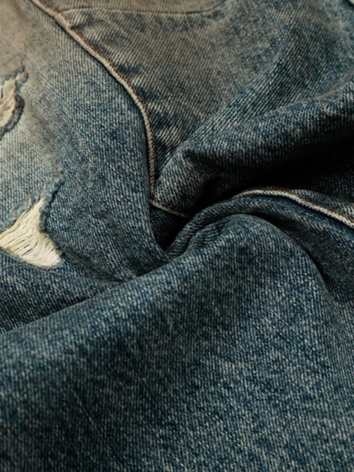 Vintage Mud-Dyed Distressed Barrel Jeans