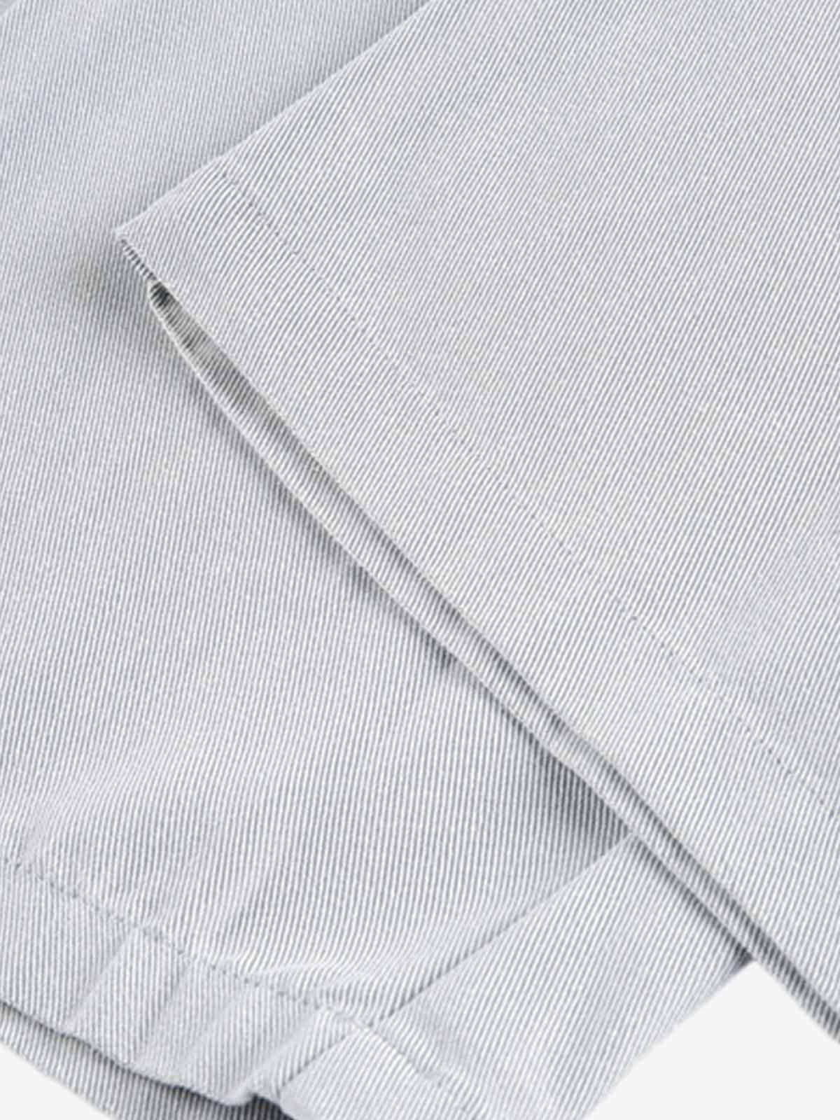 Pleated Button-Down Scimitar Jeans