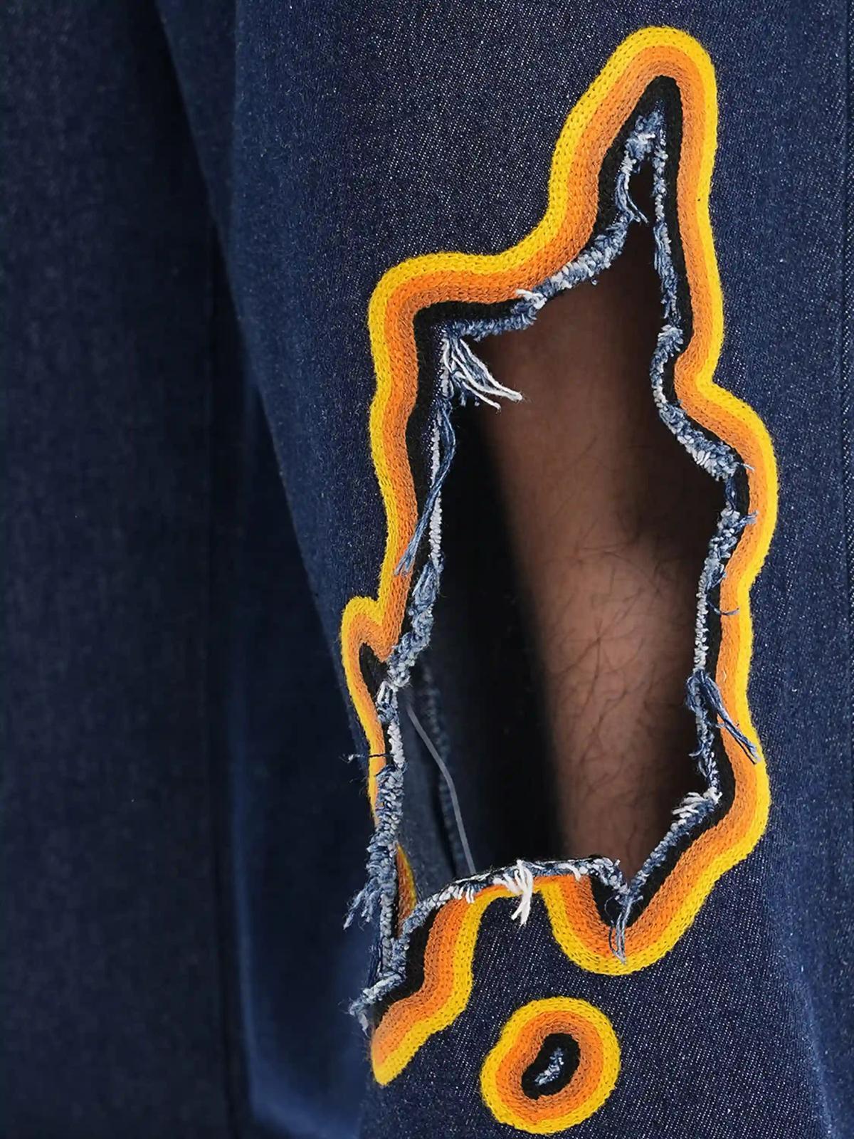 Flame-Scarred Towel Embroidered Jeans